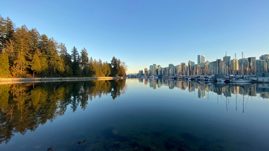 Image of inlet reflecting Vancouver skyline and Stanley Park