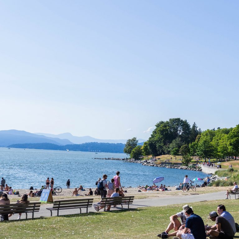 View from English Bay with people on the beach